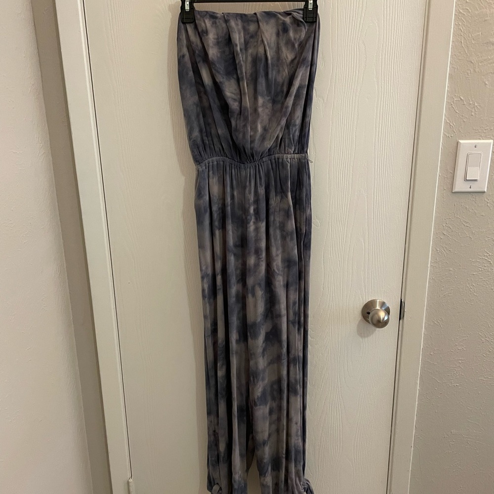 Tie dye romper. No belt included.